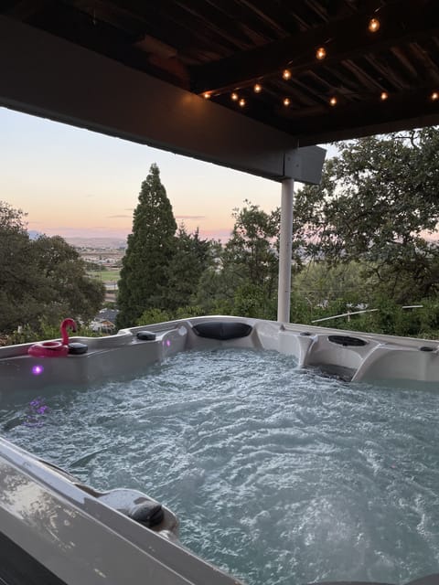 Guests enjoy listening to the birds and deer watching from the hot tub