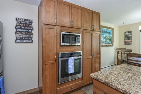 Kitchen with built in microwave and wall oven