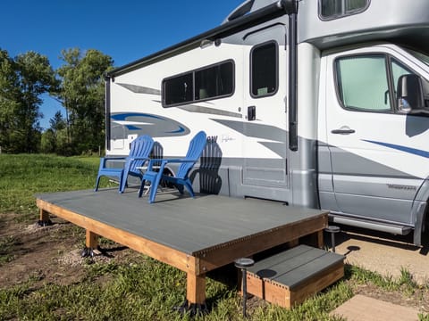 Enjoy the views and the sounds of the birds and the river from the private deck