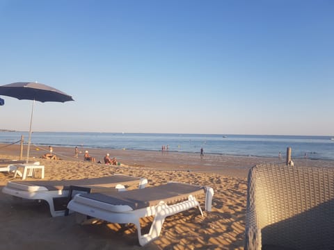 Beach nearby, sun loungers