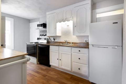 The kitchen features a dishwasher