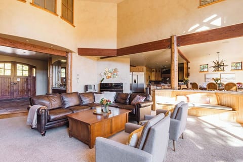 Home's Vibrant Center
-
The great room connects to all areas, with access to a gym, sauna, and massage room for endless comfort and activities.