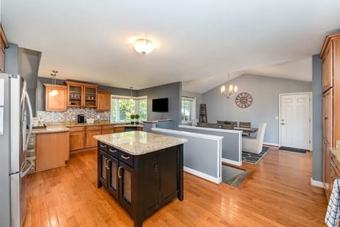 Our downstairs level is located through the open stairs in the kitchen.