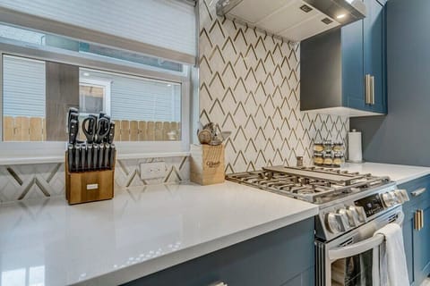 Kitchen Bliss Awaits: Our Fully Equipped Kitchen Comes Complete with All the Amenities and Utensils You Need. It's Fully Stocked for Your Culinary Adventures!