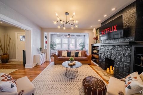 Living area | Smart TV, fireplace, books