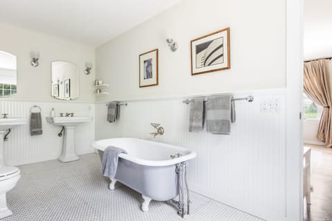 Combined shower/tub, hair dryer, towels, soap