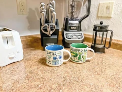 Enjoy morning coffee at the kitchen, or one of the three private out door patios