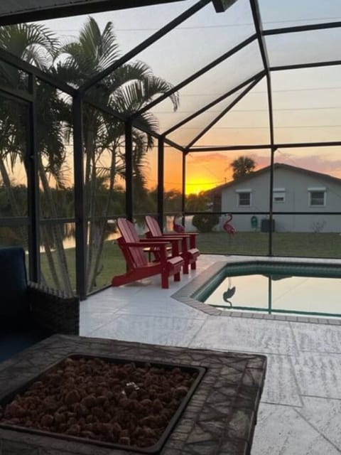 A heated pool, sun loungers