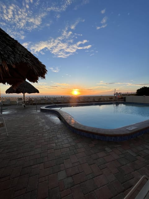 Enjoy our fabulous sunsets from our pool and hot tub directly on the beach