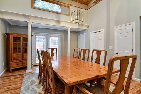 Large dining room table with seating for 8