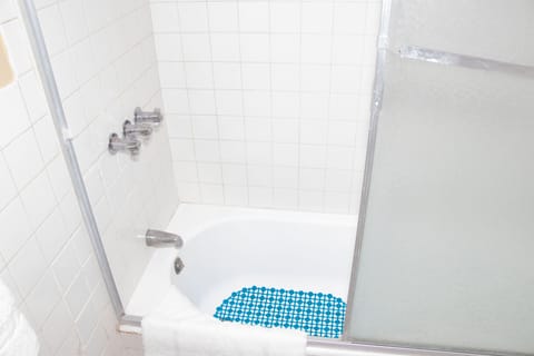 Combined shower/tub, hair dryer, towels, soap