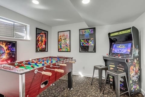 Gameroom with foosball and arcade