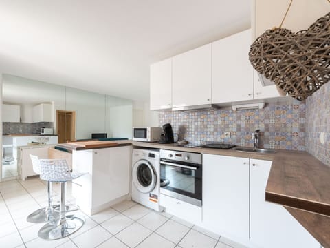 Plant, Furniture, Property, Window, Chair, Building, Wood, Lighting, Flowerpot, Architecture