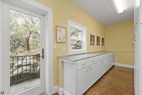 Large space for doing laundry or storing your supplies, suitcases, etc.