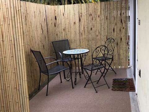 Outdoor patio with table and chairs