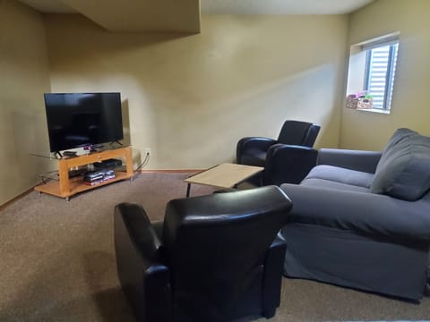 Basement family room with 50 inch tv