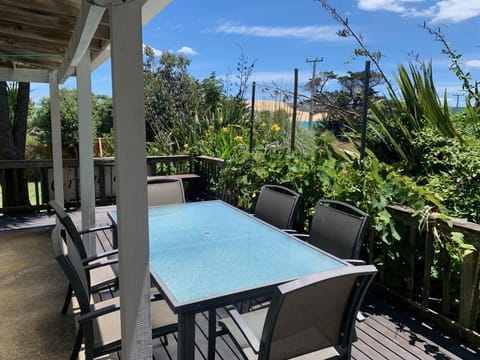 Large covered deck with BBQ and seating for 12