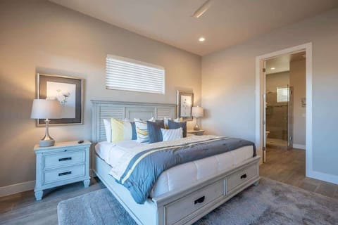 Master bedroom with private bathroom in home #65