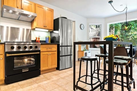 Start your day at the breakfast bar with lush green views