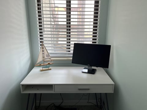Dedicated office space with extra monitor