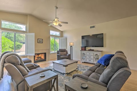 TV, fireplace, books