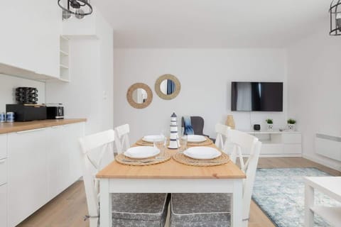 Watch your favorite shows on the flat-screen television in the elegant living area.