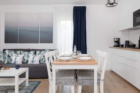 The living room's decor combines elegance with functionality. 