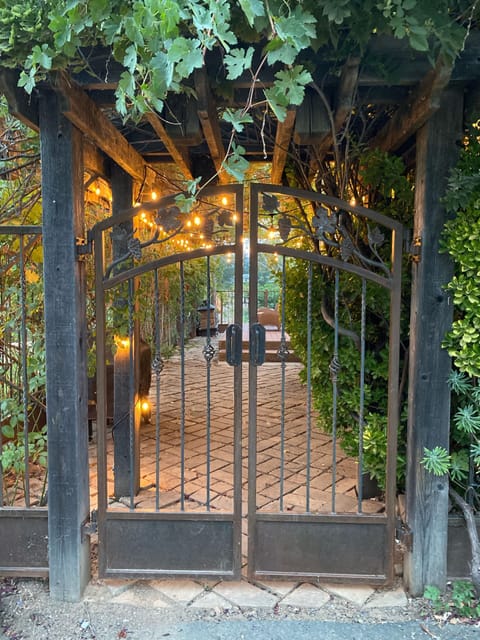 Wrought iron gate entrance to Lake Cottage.