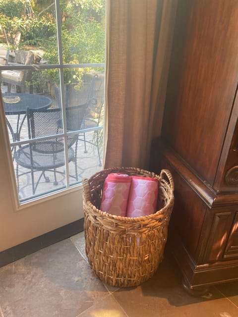 Pool and spa towels provided and 2 person table just outside French doors