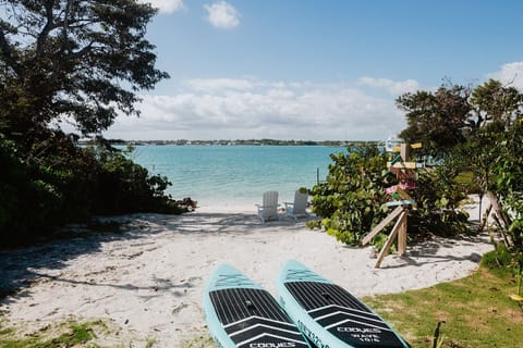 On the beach, sun loungers, beach towels