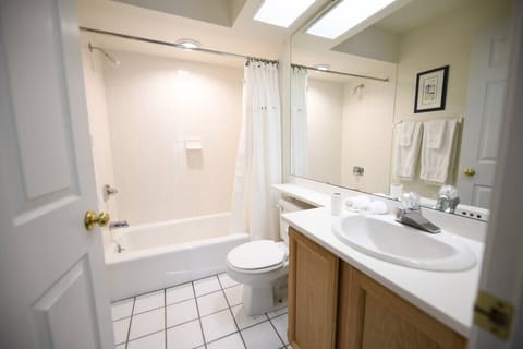 Combined shower/tub, hair dryer, towels, soap