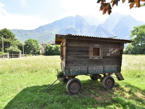 Flooring, Interior Design, Floor, Apartment, Balcony, Ceiling, Condominium, Chair, Shade, Porch