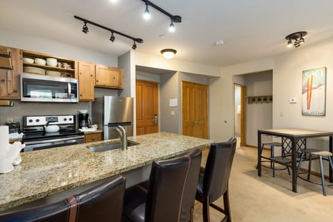 Breakfast bar with seating for three.