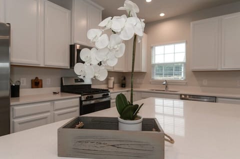 Beautifully decorated with a mix of modern touches and classic charm, this townhouse offers a warm and inviting atmosphere. Thoughtfully styled with cozy furnishings and tasteful accents, every room is designed to make you feel right at home