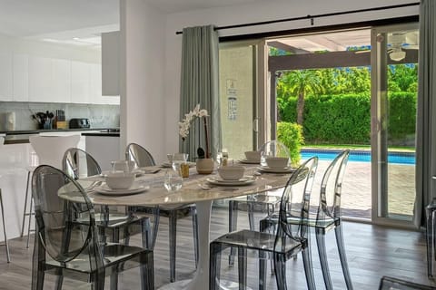 Indoor dining area with access to the patio.