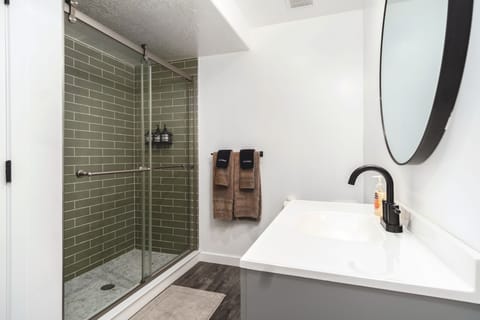 Combined shower/tub, hair dryer, towels, soap