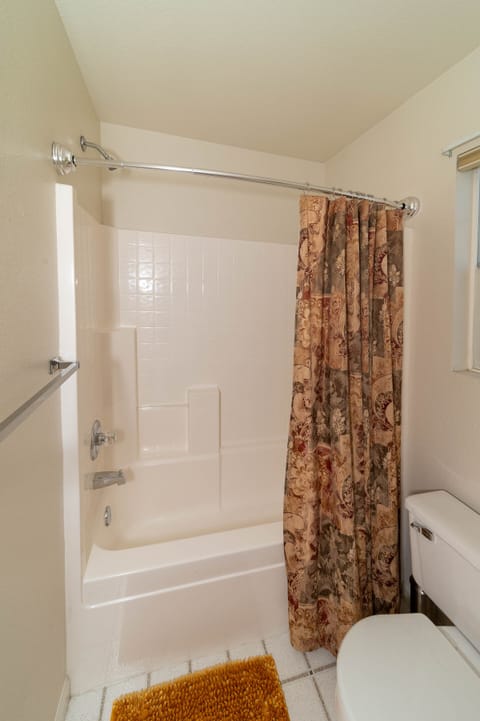 Combined shower/tub, hair dryer, towels, soap