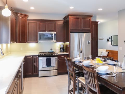 Our gourmet kitchen is equipped with seating and tableware for 10 or more