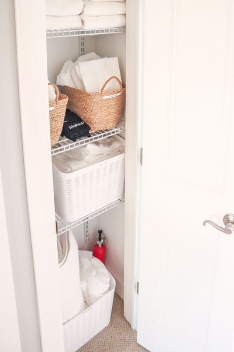 Our linen closet upstairs is stocked with added linens and a sewing kit