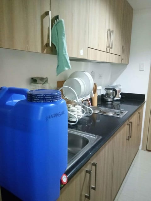 Fridge, microwave, electric kettle, cookware/dishes/utensils