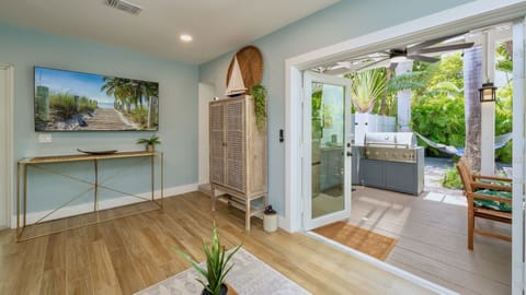 Large flat screen TV in the back living room...