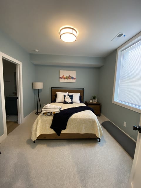 Basement bedroom with Queen bed and attached full bath