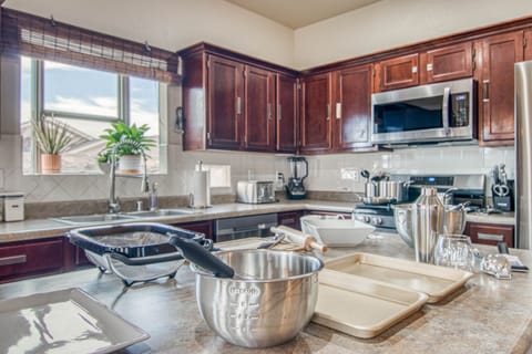 Strainer, mixing bowls, sheet pans, and more for the cook