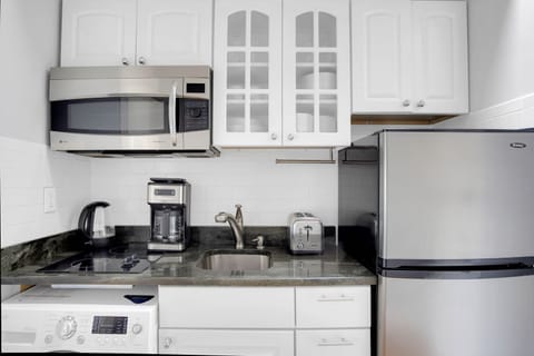 Fridge, microwave, stovetop, coffee/tea maker