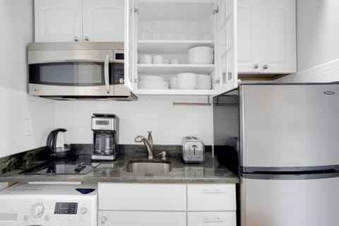 Fridge, microwave, stovetop, coffee/tea maker