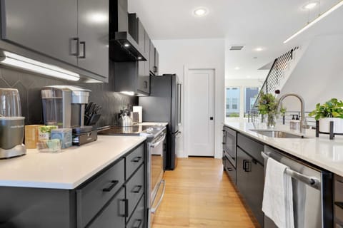 Fully stocked kitchen with Keurig, tea kettle, nutribullet, and more