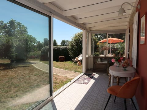Cloud, Sky, Water, Mountain, Building, Highland, Tree, Body Of Water, Window, Lake