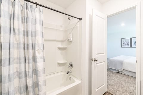 Combined shower/tub, hair dryer, towels, soap