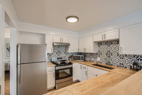 The remodeled kitchen has tons of countertop space and all you'll need for your stay