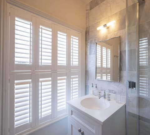 Bathtub, hair dryer, towels